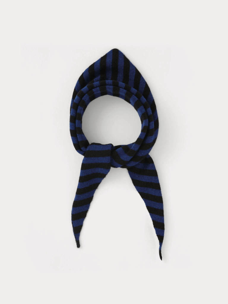 black and blue striped triangle scarf tied in a knot