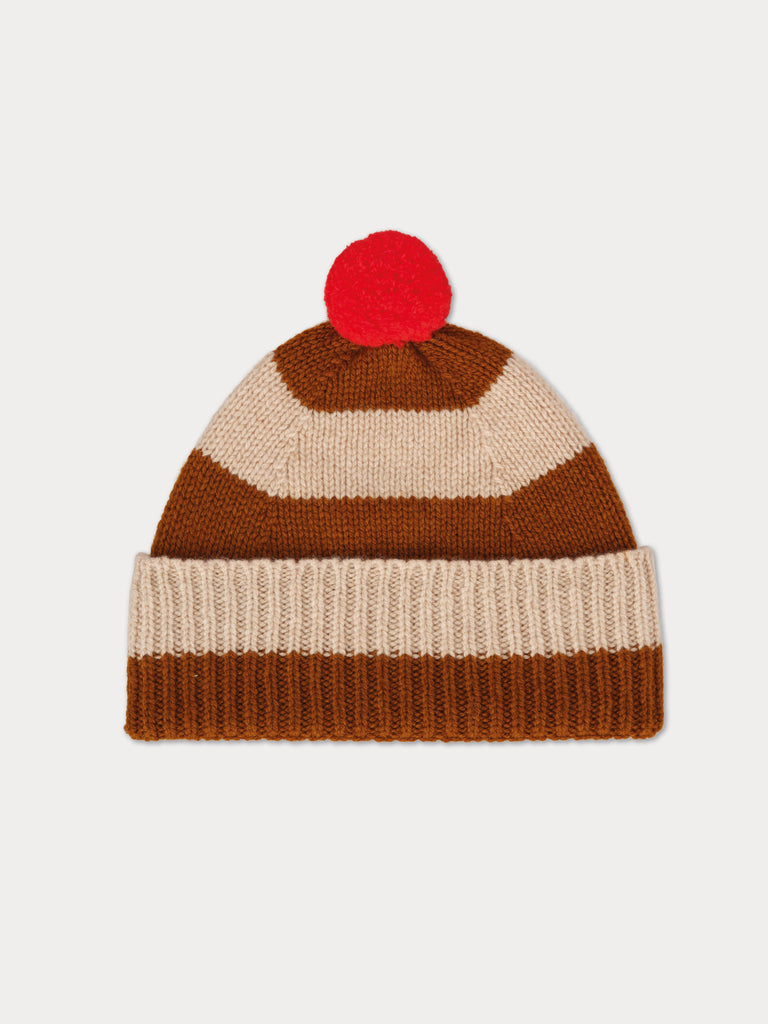 brown and cream striped beanie with red pompom